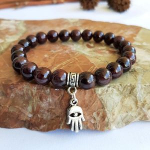 Pulsera de Granate con Mano de Fátima - Tienda esotérica en Chile