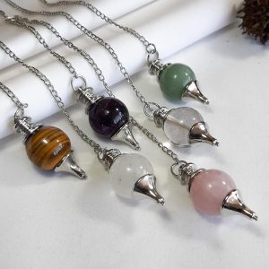 Pendulo de piedra redondo - Casa Mannaz Venta de Tarot y Oráculos Chile